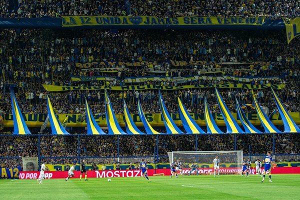 What are the benefits of incorporating yoga into a footballer's weekly training schedule?